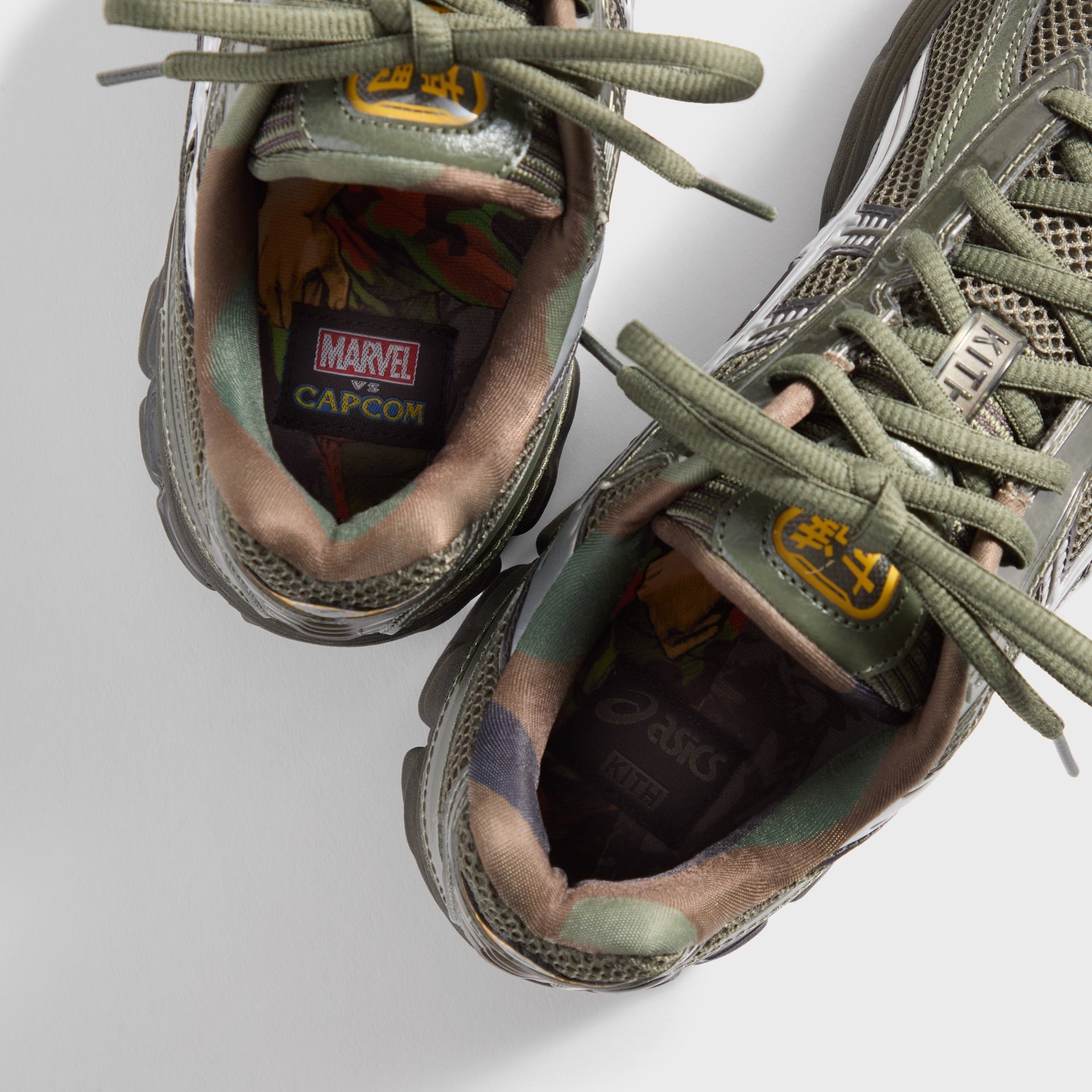 Marvel vs. Capcom | Kith for ASICS GEL-KAYANO® 12.1 Captain America vs. Guile Double Box - Dive Blue / Gunmetal / Deep Depths / Gunmetal
