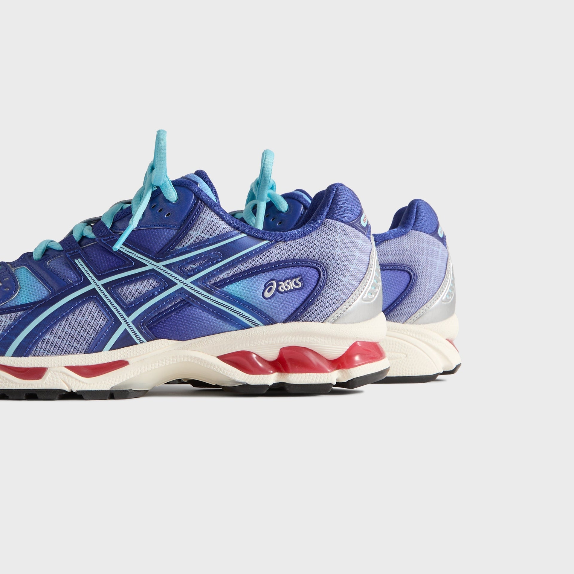 Marvel vs. Capcom | Kith for ASICS Gel-Nimbus 10.1 Iron Man vs. Mega Man Double Box - Italian Straw / Molten Lava / Mazarine Blue