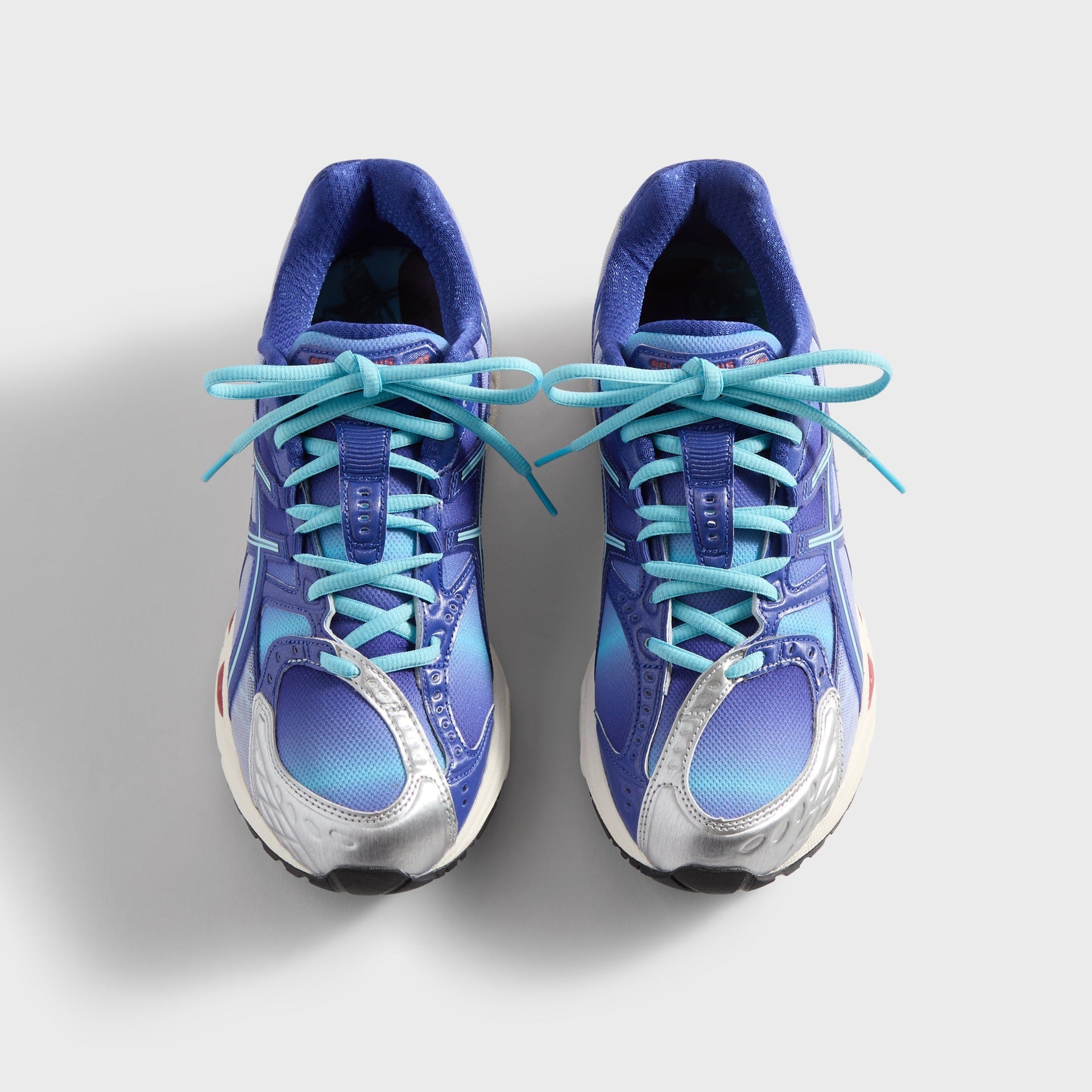 Marvel vs. Capcom | Kith for ASICS Gel-Nimbus 10.1 Iron Man vs. Mega Man Double Box - Italian Straw / Molten Lava / Mazarine Blue
