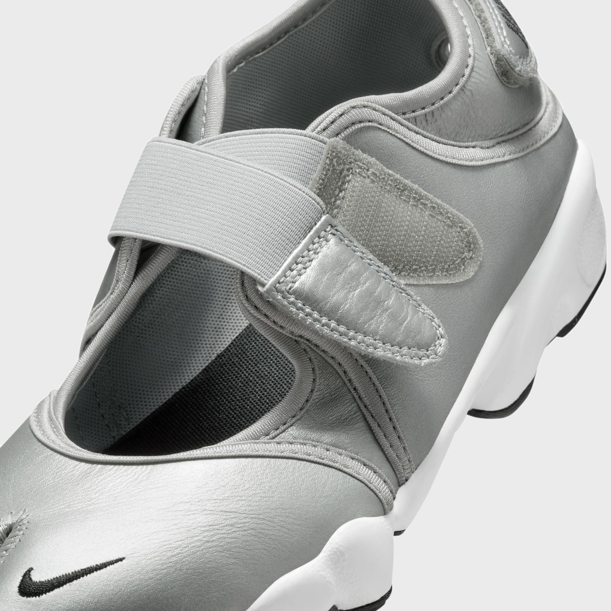 Nike WMNS Air Rift - Metallic Silver / Black – Kith Japan