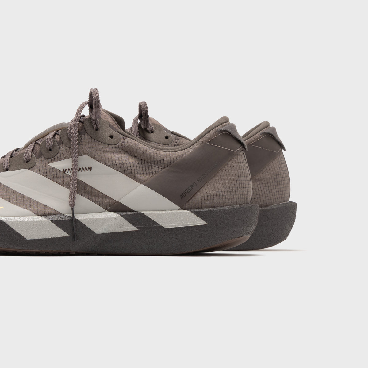 adidas x SATISFY WMNS Adizero Adios 9 - Brown / Pearl Metallic / Charcoal
