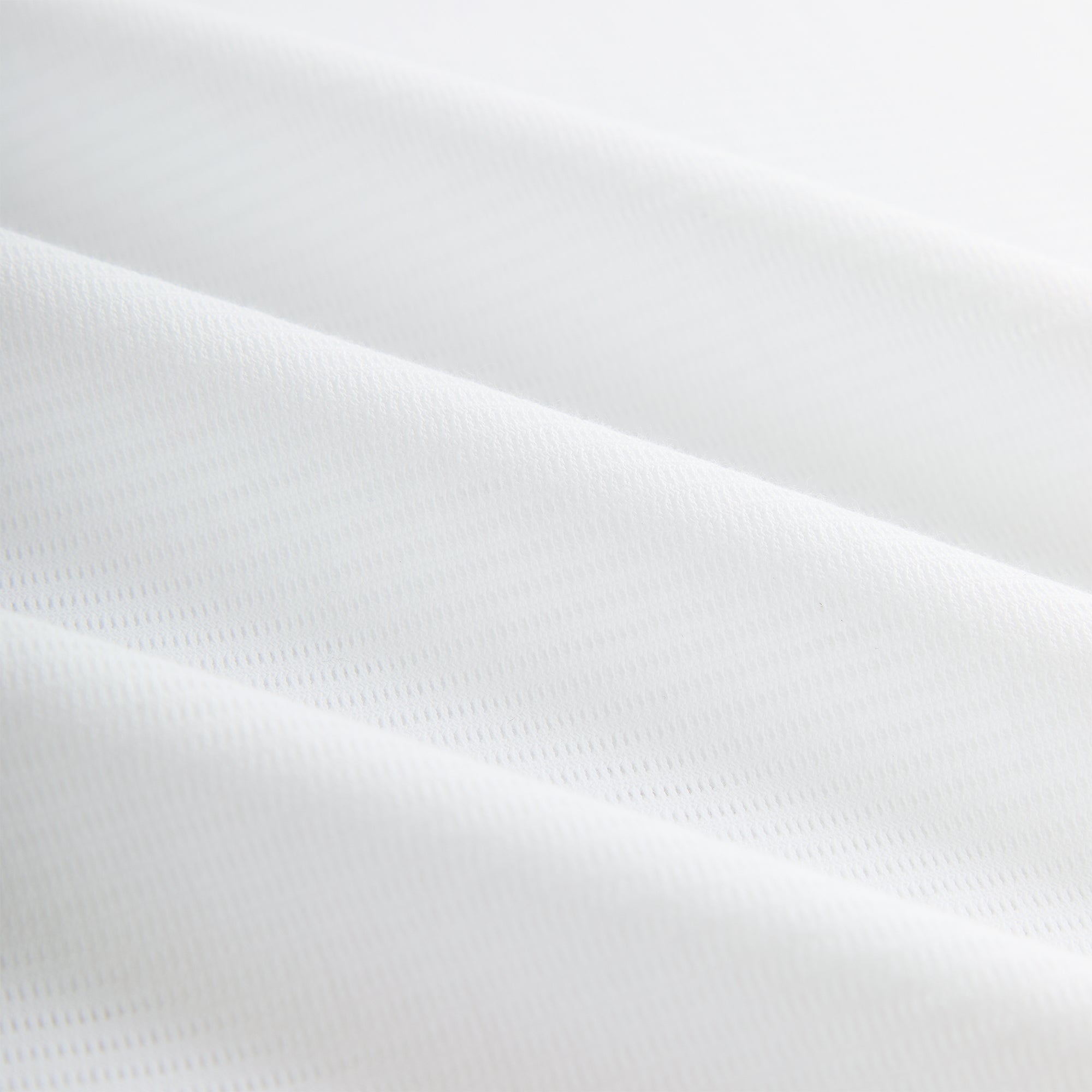 Kith Pointelle Mesh Heathrow Tee - White – Kith Japan