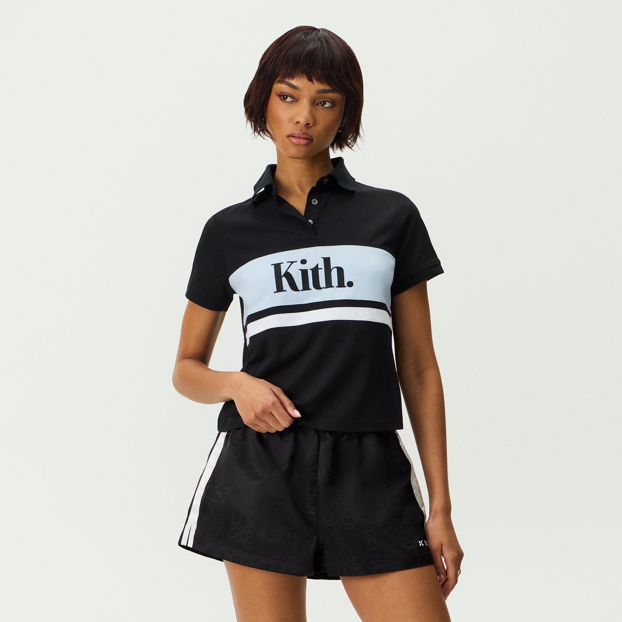 Kith Women Breda Paneled Polo - Black – Kith Japan Kith Women Breda Paneled Polo - Black – Kith Japan