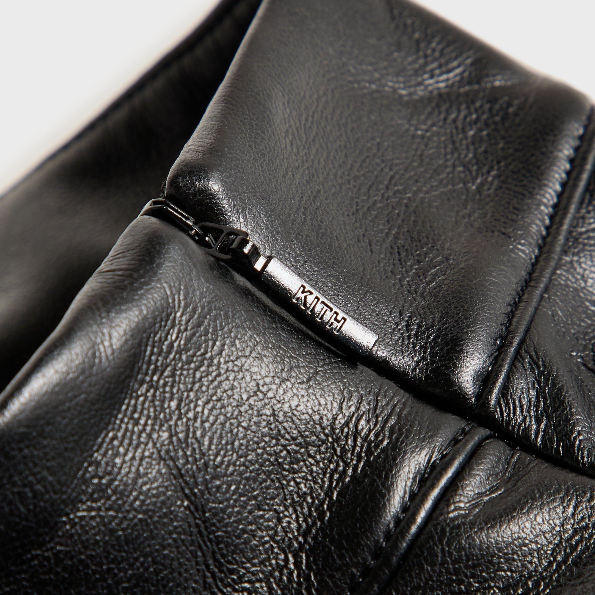 Kith Women Duri Faux Leather Asymmetrical Zip Top - Black – Kith Japan
