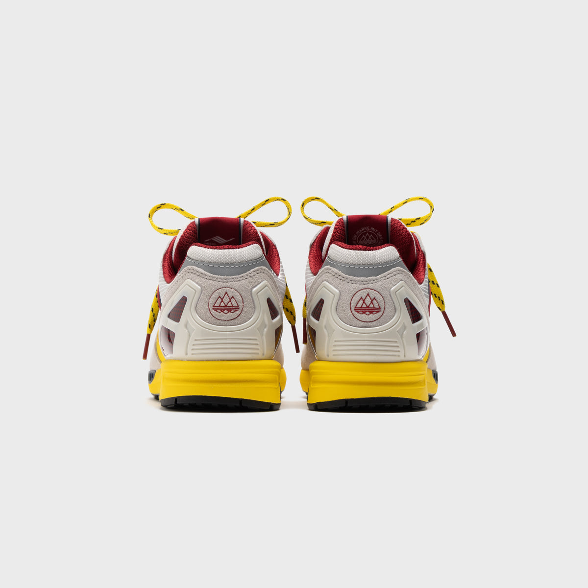 adidas × Arsenal SPZL F. C. ZX - Crystal White / Crystal White / Aurora Ink
