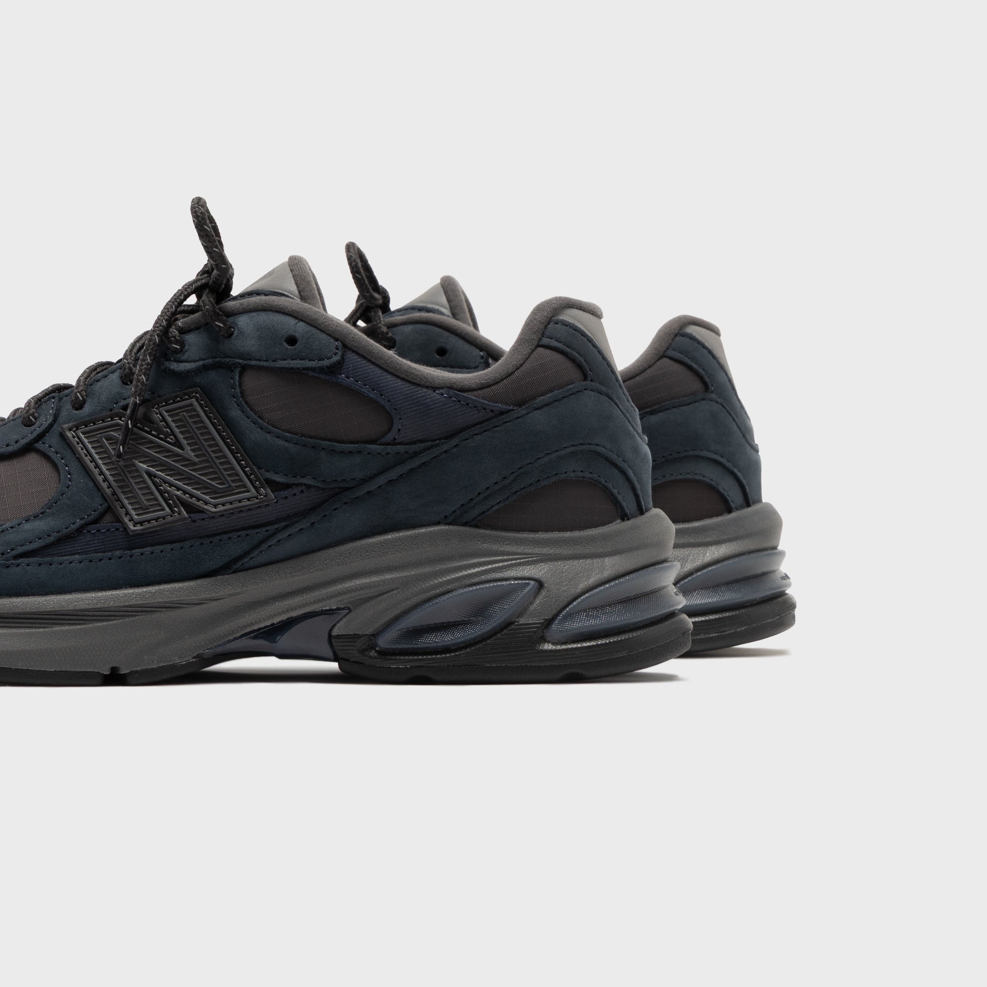 New Balance U2010 52C - Outerspace / Faded Black – Kith Japan